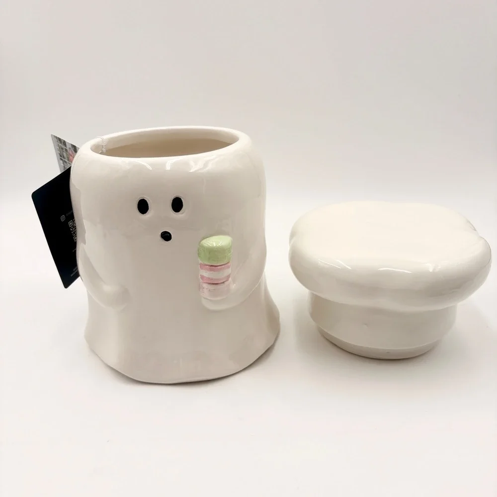 Dabney Lee Ghost Baker Ceramic Utensil Holder Cookie Jar Pink Bow Macarons NEW